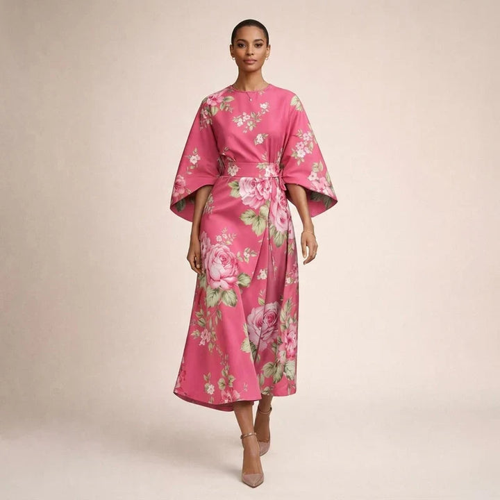 CLEMENTINE | Florale Midi met sculptuur taille en luchtige elegantie