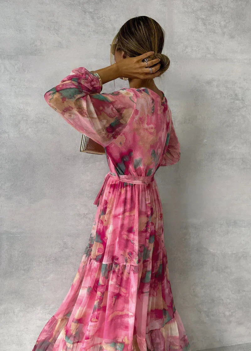 ZOEY | Levendige bloemen wikkeljurk met flatterende lagen-silhouet