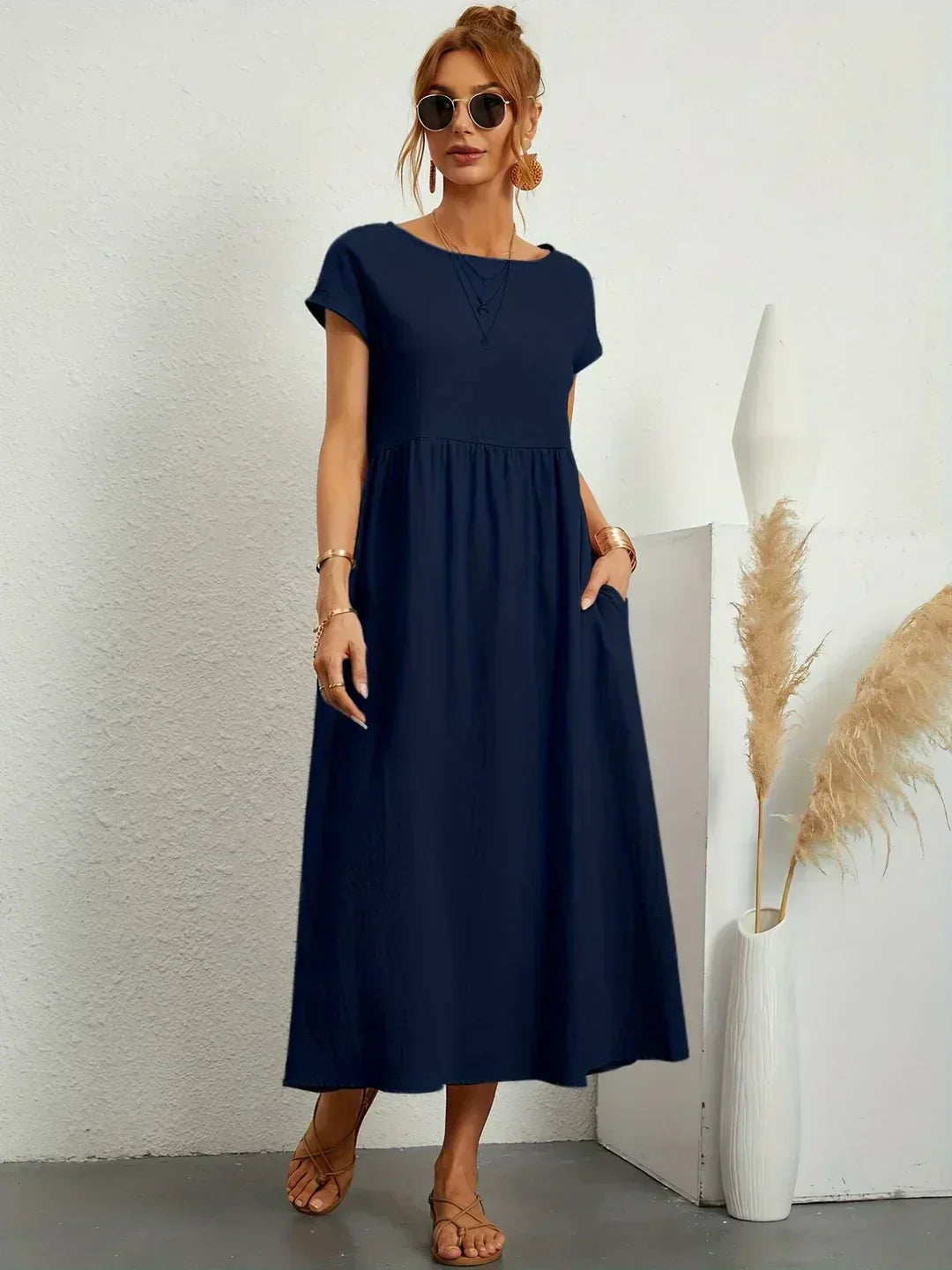 HEIKE | VLOEIEND MIDIKLEID VAN TIJDLOZE ELEGANTIE