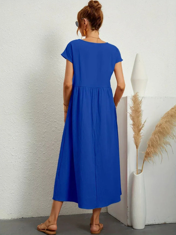HEIKE | VLOEIEND MIDIKLEID VAN TIJDLOZE ELEGANTIE