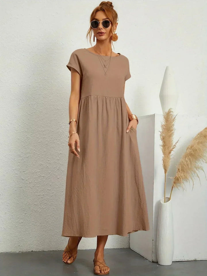 HEIKE | VLOEIEND MIDIKLEID VAN TIJDLOZE ELEGANTIE