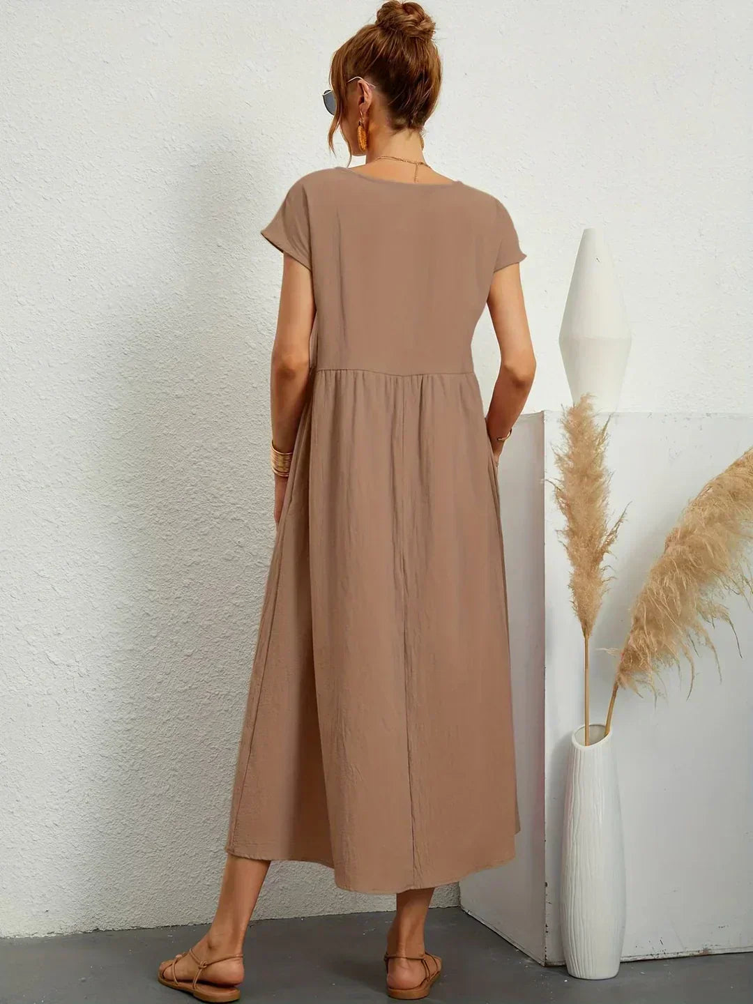 HEIKE | VLOEIEND MIDIKLEID VAN TIJDLOZE ELEGANTIE