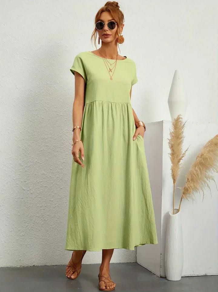 HEIKE | VLOEIEND MIDIKLEID VAN TIJDLOZE ELEGANTIE